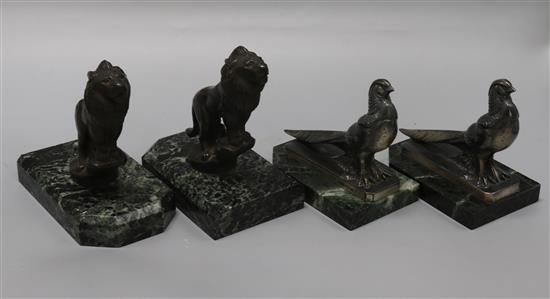 Maurice Frécourt. Two pairs of Art Deco bronzed and silvered metal bookends, roaring lions and Asian pheasants, 5.75in. and 5.5in.